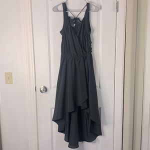 High low black dress with cut out distressed back.